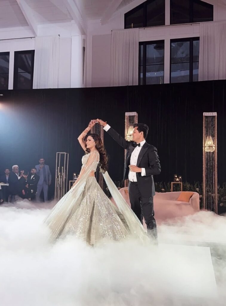 Couple&rsquo;s first dance at an Atlanta, Georgia wedding reception featuring romantic lighting and an elevated ballroom celebration.